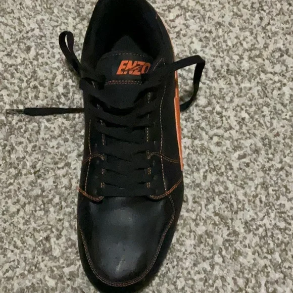 Travis Scott Black and Orange Athletic Shoes